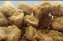Tahu Sumedang goreng berwarna kuning keemasan dengan tekstur renyah, salah satu camilan khas yang dikenal luas di Indonesia.
Foto: Historia88.com